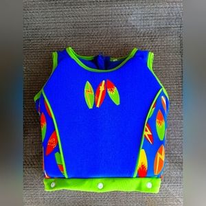 Boy's Size 2T-5T blue and neon green with surfboards zippered life jacket.